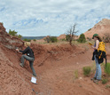 Geoscientists Jessica Whiteside and Maria Dunlavey taking rock samples at Ghost Ranch.